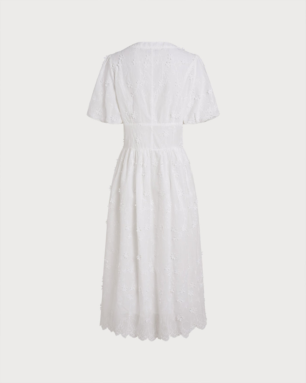 Vestido midi blanco abierto como túnica sobre bañador