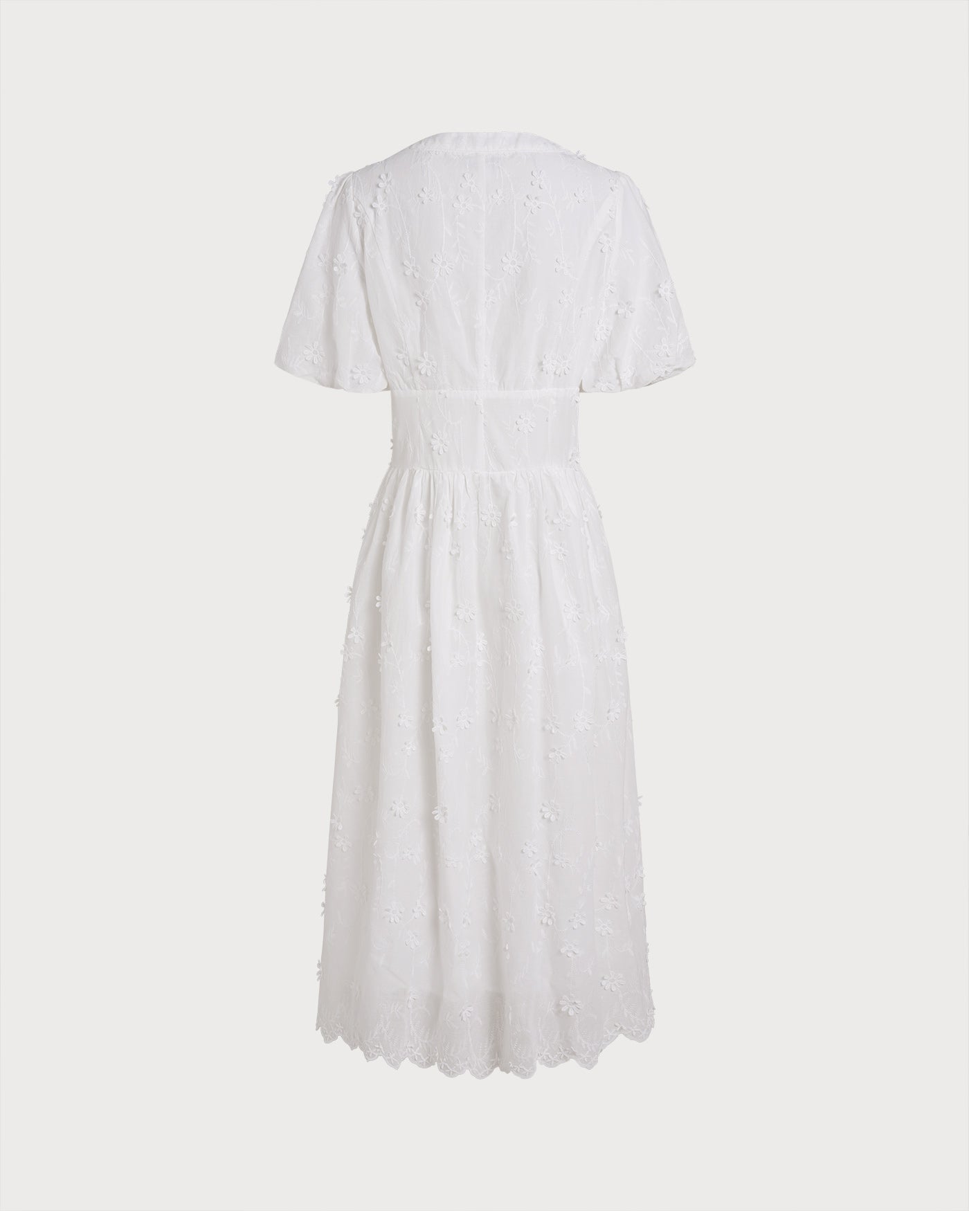 Vestido midi blanco abierto como túnica sobre bañador