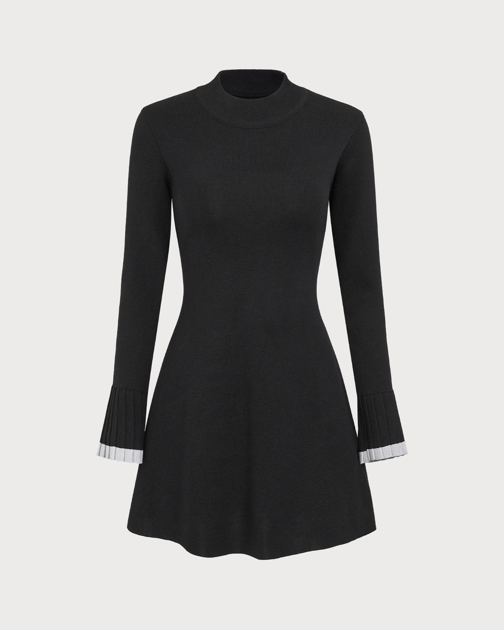 Minivestido Negro de Punto con Detalles en Contraste y Manga Larga