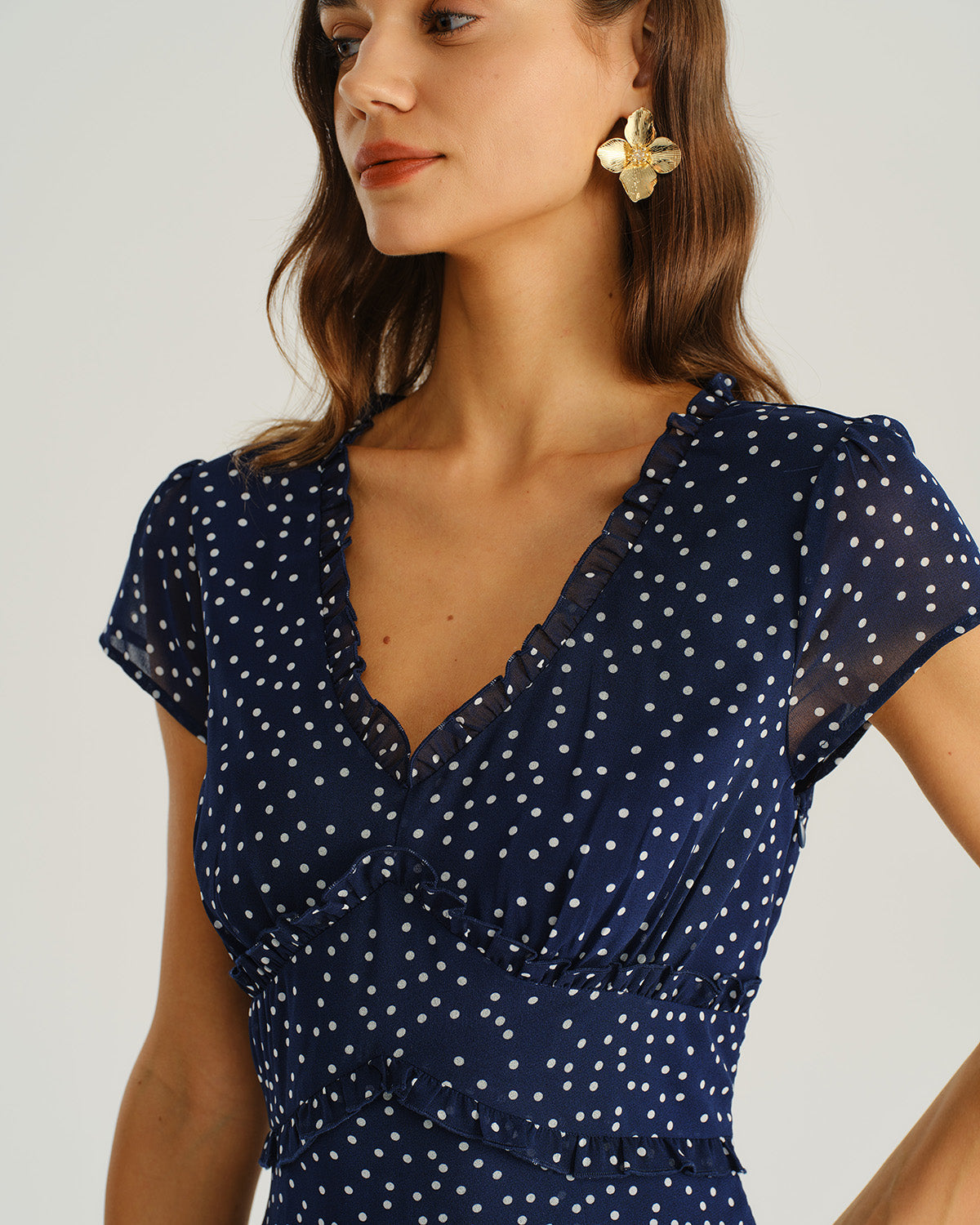 Vestido midi de lunares azul marino, vista trasera
